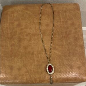 Gold Necklace with Red Gemstone Pendant